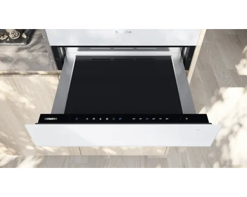 Tiroir chauffant Siemens avec éléments de commande.