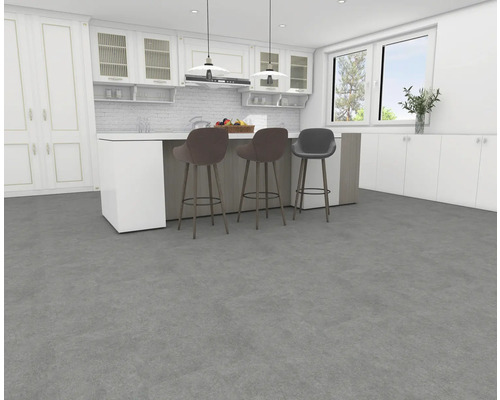 Cuisine claire avec îlot de cuisine et tabourets de bar