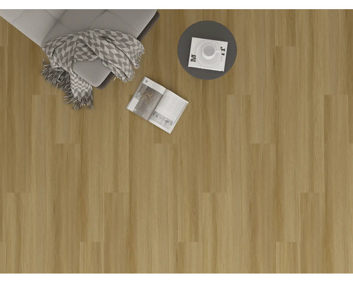 Photo d''intérieur avec revêtement de sol, fauteuil, couverture, table et magazine