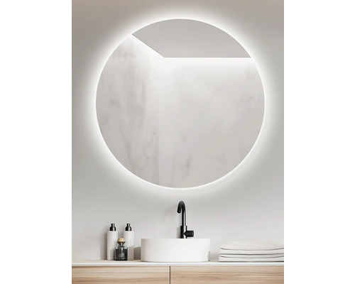 Salle de bain moderne avec miroir rond et éclairage LED au-dessus d''un lavabo.