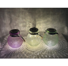 Drei Solarleuchten aus Glas mit Tragegriff