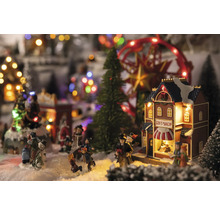 Weihnachtsdorf Szene mit Figuren, Bäumen, Karussell und Geschenk Shop