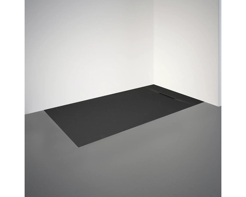 Receveur de douche en fonte minérale dans un coin d''une salle de bain