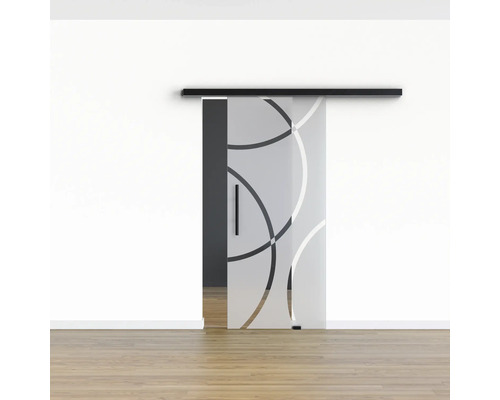 Porte coulissante en verre avec motif circulaire et suspension noire devant un mur