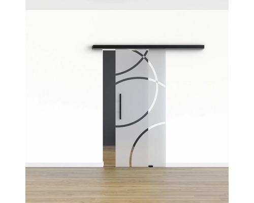 Porte coulissante en verre avec motif circulaire dans une pièce lumineuse