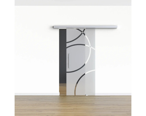 Porte coulissante en verre avec motif circulaire dans une pièce