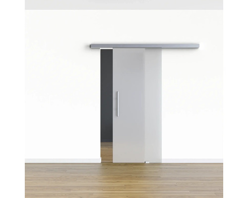 Porte coulissante en verre avec poignée et rail devant un mur.