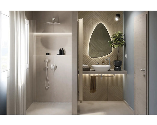 Salle de bain moderne avec douche, lavabo et miroir éclairé
