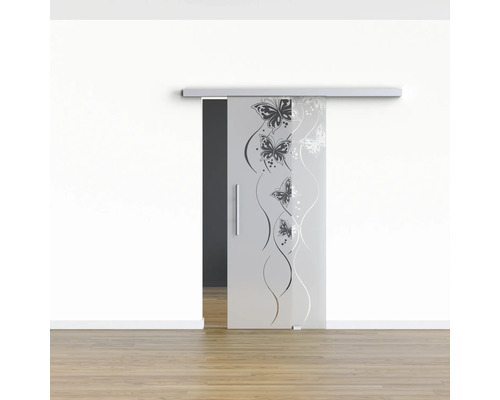 Porte coulissante en verre avec motif papillon devant un mur