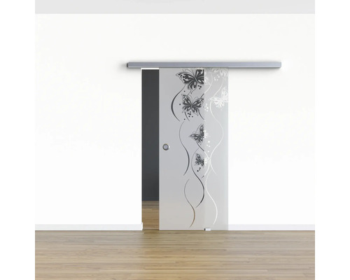 Porte coulissante en verre avec motif papillon devant un mur