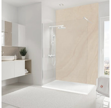 Salle de bains lumineuse avec cabine de douche, lavabo et tapis blanc
