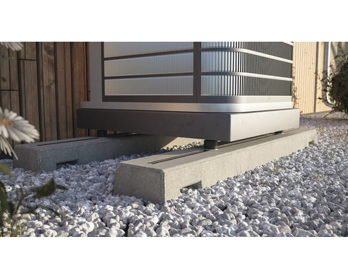 Support de fondation pour pompe à chaleur sur lit de gravier