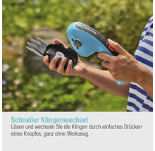 Gardena Akku-Grasschere mit wechselbaren Messern in der Hand.