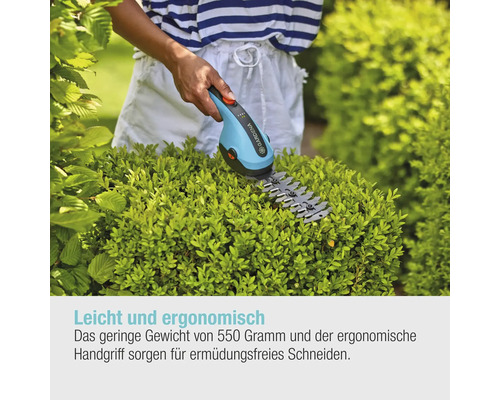 Frau schneidet Buchsbaum mit Akku-Grasschere von Gardena