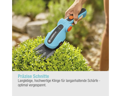 Cisailles à gazon sans fil Gardena coupant une haie de buis