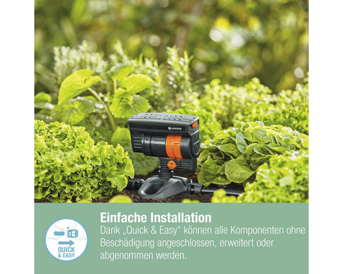 Arroseur oscillant Gardena en utilisation entre les plantes