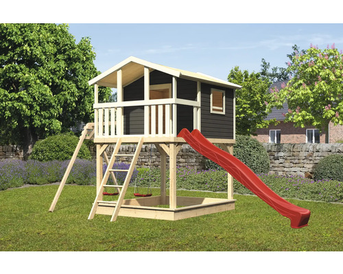Cabane de jeux avec des pilotis Karibu Benjamin 198 x 243 cm bois naturel Tour de jeux avec toboggan, échelle et bac à sable dans le jardin
