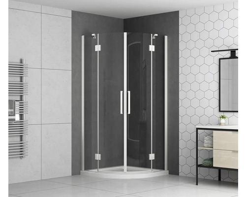 Cabine de douche avec portes pivotantes et radiateur sèche-serviettes dans la salle de bain.