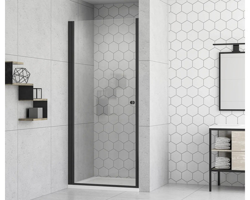 Salle de bains avec paroi de douche en verre et cadre noir