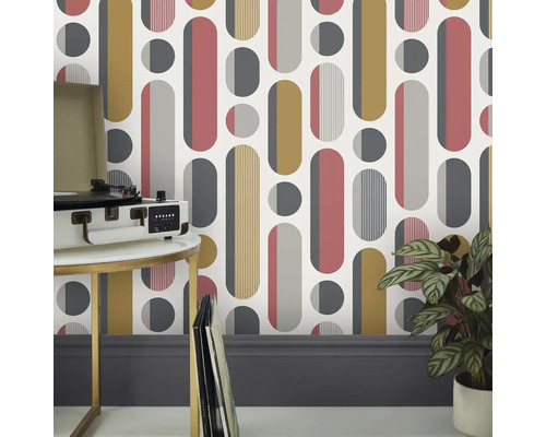 Tapete mit geometrischem Muster, Schallplattenspieler und Zimmerpflanze