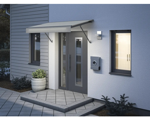 Zone d''entrée d''une maison avec auvent, porte, boîte aux lettres et fenêtre