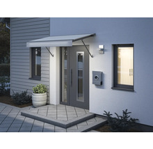 Vue extérieure d''une maison avec auvent, porte d''entrée, boîte aux lettres et éclairage