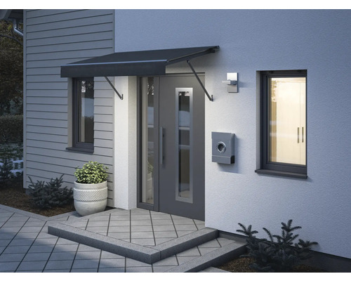 Zone d''entrée d''une maison avec porte d''entrée, auvent et boîte aux lettres