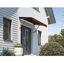 Auvent de porte d''entrée monté sur une façade de maison