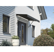 Façade de maison avec un auvent de porte d''entrée installé