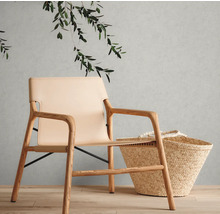 Scène avec un fauteuil en bois et en cuir ainsi qu''un panier