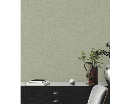 Papier peint texturé sur un mur au-dessus d''une armoire noire