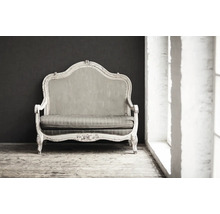 Sofa ancien avec cadre en bois et revêtement en tissu