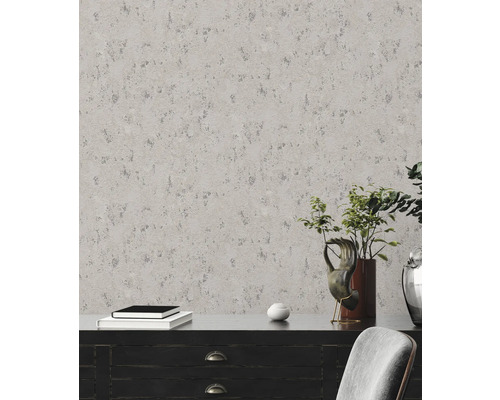 Gros plan d''un mur avec du papier peint gris et texturé