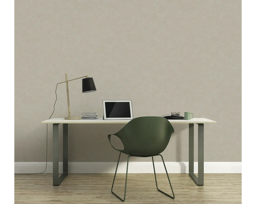 Bureau avec bureau, lampe, ordinateur portable et chaise devant un papier peint structuré