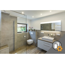 Salle de bain moderne avec douche, toilettes, lavabo et miroir
