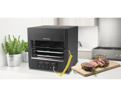 Gastro-Tischgrill mit Temperaturanzeige und einem Steak auf einem Schneidebrett