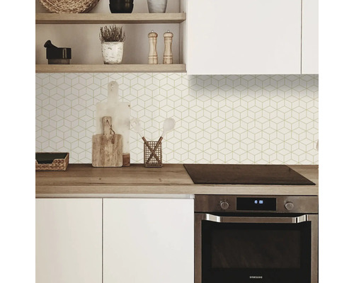 Scène de cuisine avec des motifs de carreaux géométriques et des ustensiles de cuisine