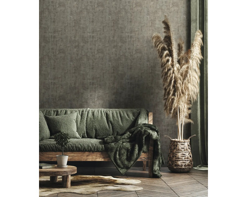 Salon avec canapé, décoration et parquet pour une ambiance chaleureuse.