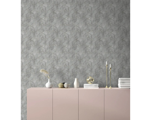 Salon avec papier peint géométrique gris et buffet rose