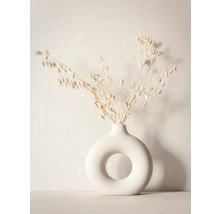 Vase décorative avec trou et herbes séchées