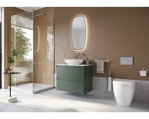 Salle de bains moderne avec douche, lavabo, miroir et toilettes.