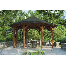 Pavillon de jardin en bois avec table et chaises dans le jardin