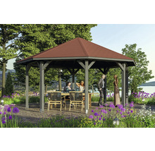 Pavillon autoportant avec table et mobilier de jardin dans un jardin fleuri