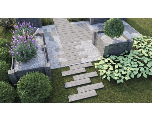 Scène de jardin avec des allées en bois, des parterres de gravier et des plantes