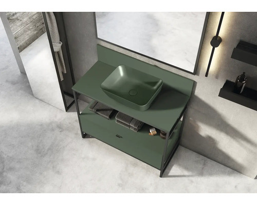 Badezimmer mit Waschtischunterschrank und Aufsatzwaschbecken in einem hellen Raum.