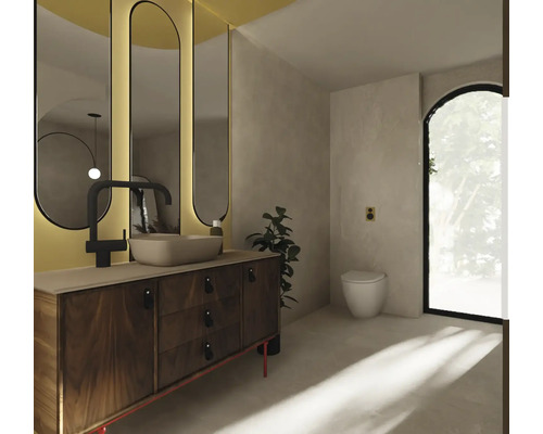 Salle de bains avec lavabo, miroir et toilettes pour une atmosphère lumineuse et conviviale