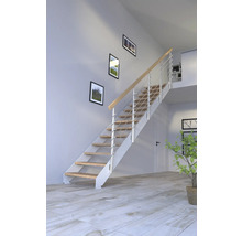 Escalier avec marches en bois et garde-corps en métal dans une pièce aménagée de façon moderne.