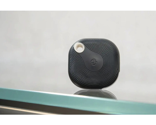 Localisateur de clés noir avec motif ondulé