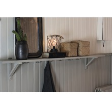 Étagère murale décorative avec miroir, cactus, lampe et boîtes de rangement