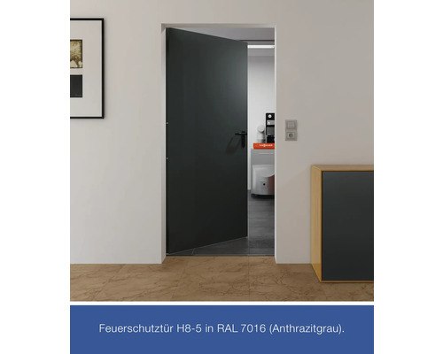 Geöffnete Brandschutztür in Anthrazitgrau in einem modernen Interieur